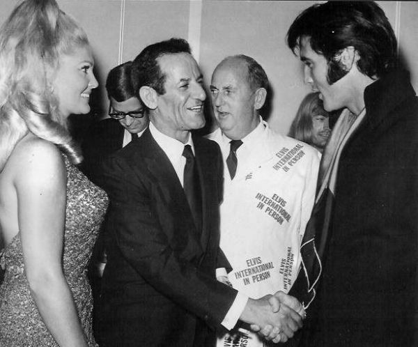 1969 Elvis shaking hands Alex Shoofey and Joanie Adams Colonel Parker background