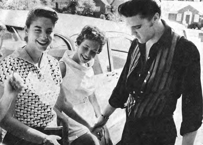 1970 November 14 Elvis candid touching arm of pretty girl another there 2 kinda RARE candid